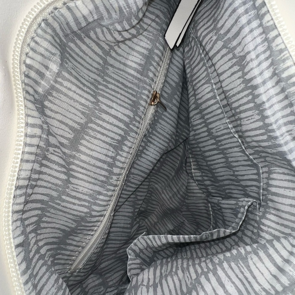 White Crossbody Bag with Intricate Cutout Design - Picture 4 of 5